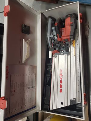 a box with tools inside of it on a table