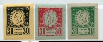 three different colored postages with a woman ' s face on them