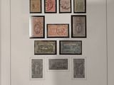 an image of a picture of a collection of stamps on a wall