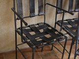 two chairs that are sitting next to each other on the floor