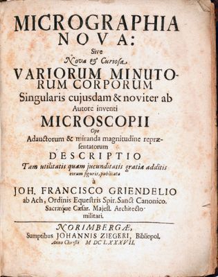 an old book with a black and white title on it