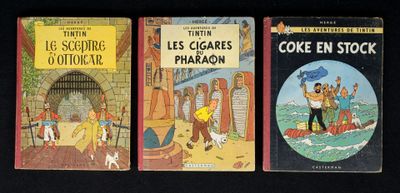 trois livres pour enfants sont alignés sur une surface noire