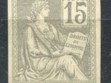 a stamp with an image of a woman sitting on a chair