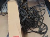 a box with a bunch of wires in it on the floor
