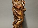 statue of a woman holding a child in her arms