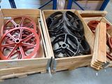 many different types of wheels in a wooden box