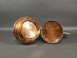 pair of antique copper plated candlesticks with brass rims