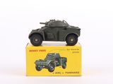 a toy army vehicle sitting on top of a box