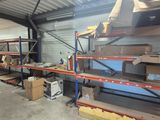 many shelves in the warehouse with boxes on them