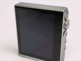 a picture of a digital camera on a white surface