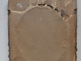 a picture of a piece of paper with a hole in it