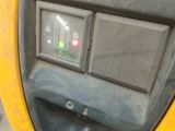 a close up of a yellow machine with buttons on it