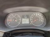 a close up of a car dashboard with a speedometer and gauges