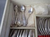 many spoons and spoons in a box together