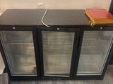 two glass doors on the side of a black cabinet