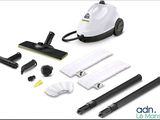 a close up of a vacuum cleaner and cleaning supplies on a white background