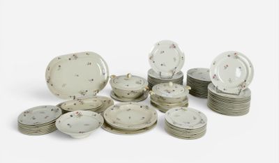 a lot of plates that are sitting on a table