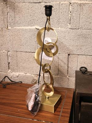 a lamp that is sitting on top of a wooden table