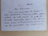 un bout de papier sur lequel est écrit un message à la main
