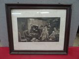 une vieille photo d'un groupe de personnes assises autour d'une table