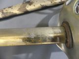 a close up of a metal object with rust on it