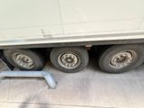 a flat tire on the side of a truck
