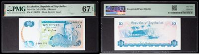 three different types of currency are displayed in a display case