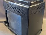 a black toaster oven sitting on a counter top