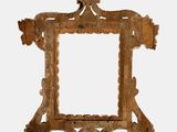 a picture of a wooden frame with a picture on it