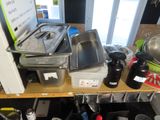 many pans and pans on a shelf in the kitchen