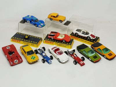 a lot of toy cars that are in a display case
