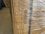 a box that is wrapped in plastic and sitting on a pallet