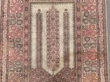 an old rug with fringes and fringes on it