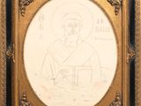 un dessin représentant un homme barbu, dans un cadre doré