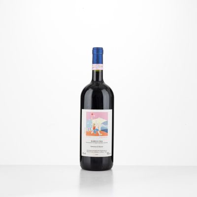a bottle of red wine sitting on top of a table