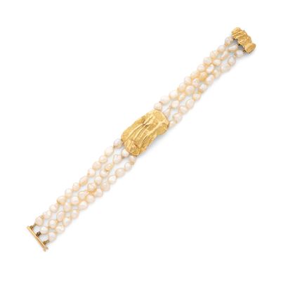 un bracelet en or 18 carats et perles de culture