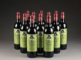 six bottles of red wine are lined up in a row