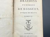 an open book with a picture of a bird on it ' s cover