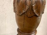 a wooden vase that is sitting on a table