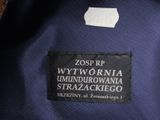 a close up of a label on a blue jacket