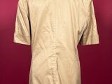 the back view of a tan shirt on a mannequin mannequin mannequin mannequin mannequin mannequin mannequin manne