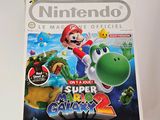 magazine cover of nintendo game magazine featuring mario and luigi on the cover