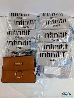 five bags of infiniti products wrapped in plastic