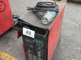 a lot of welding equipment on the ground in the parking lot