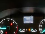 a close up of the dashboard of a car with a lot of gauges