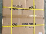 a stack of boxes that have been wrapped in yellow tape