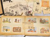 a lot of old children ' s books on the table