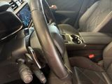a steering wheel and dashboard of a car in a car showroom