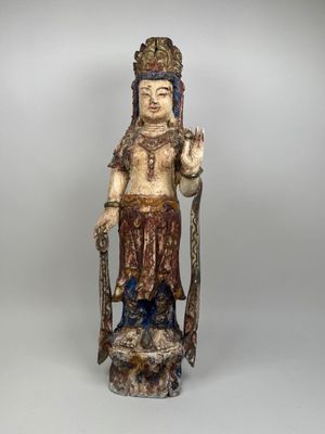 an image of a statue of a woman holding a sword
