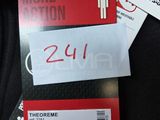 two tickets and a sticker on the back of a luggage bag